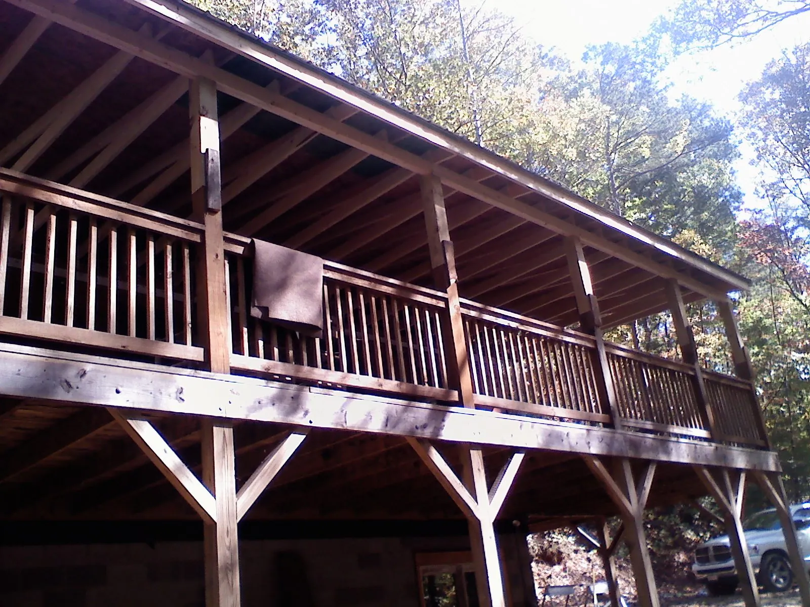 Timber framing under a new elevated porch and deck — Roof Leak Repair in East Vandergrift by Roofing Brothers